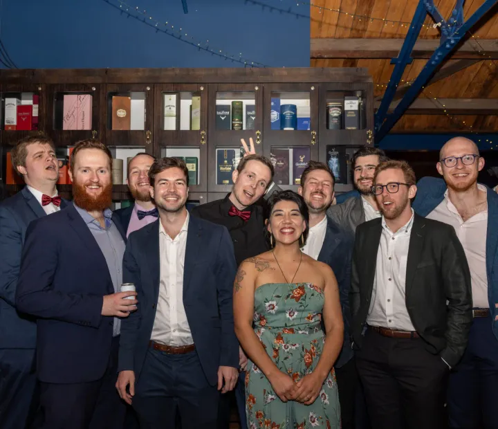 Guests posing together at an evening event