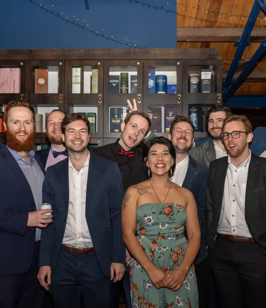 Guests posing together at an evening event