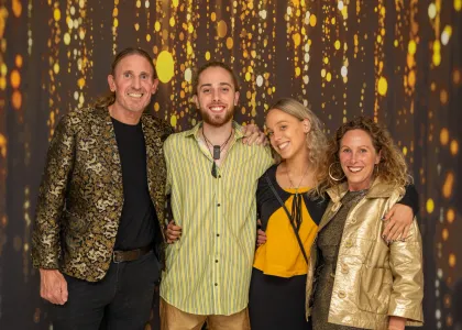 A group posing for an event photo