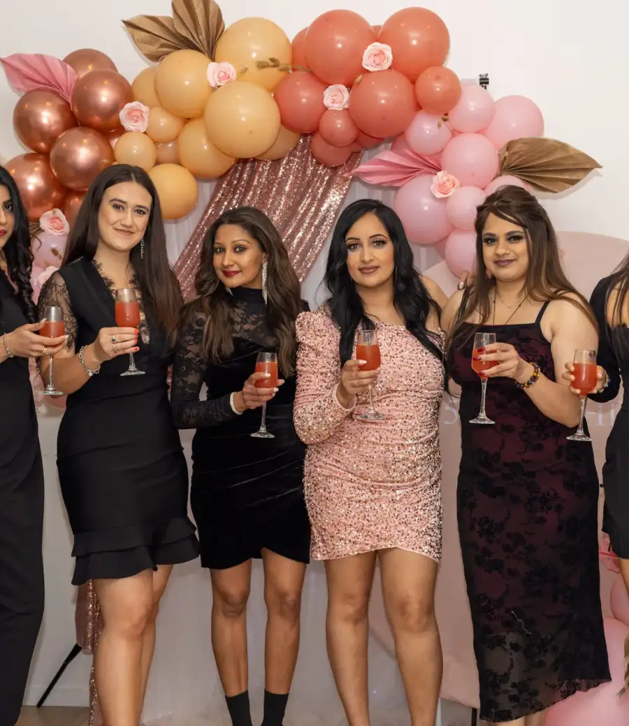 A group posing together at an event